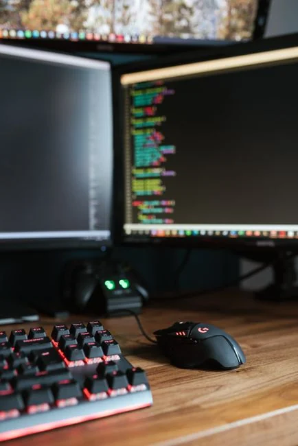 A contemporary workspace showcasing a laptop, tablet, and smartphones, ideal for tech and freelance use.